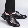 Summernew arrivalcut out perforated breathable business formal leather shoes men's casual wedding groom british pointed toe men's shoes