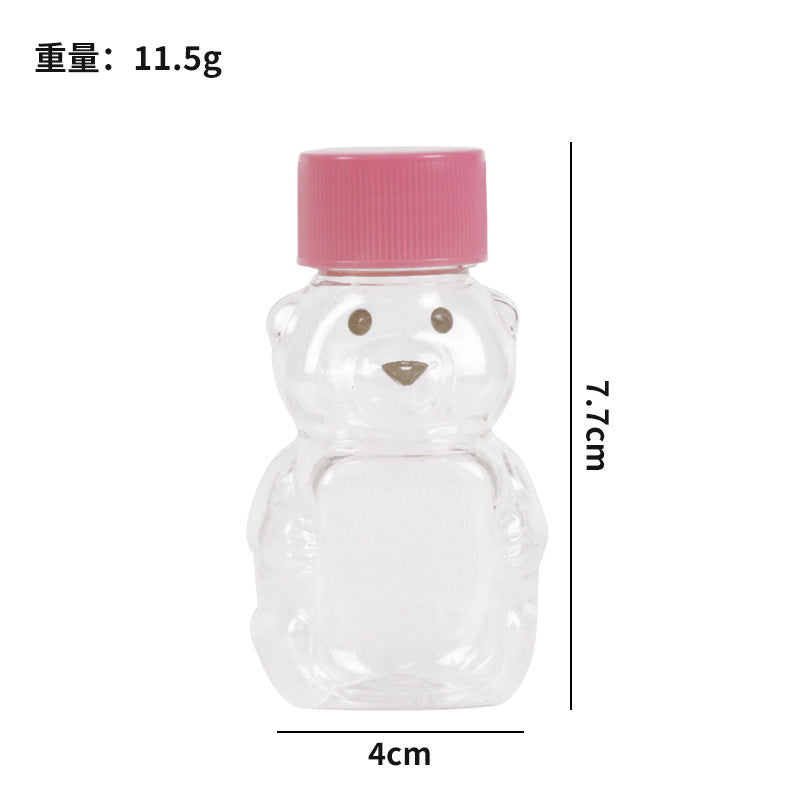 hot seller: bear-shaped clear pp plastic bottles with lids - perfect for juice, drinks, sauces, and honey. airtight sealing