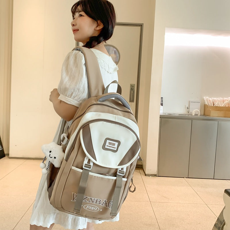 School bag for girls, junior high school students, middle school students, large capacity, versatile burden reduction, fashion trend, high school college students, backpack