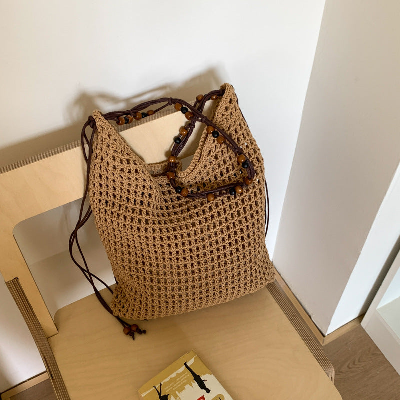 Cross-border niche design mesh bag hollow woven tote bag shoulder messenger bag 2025 new leisure style beach bag