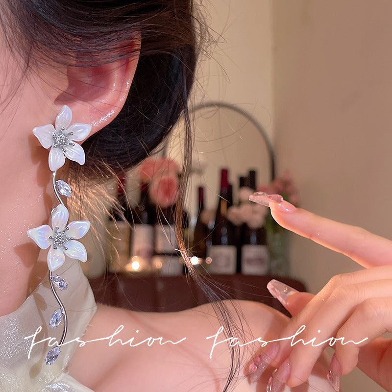 French chic zircon tassel flower stud earrings - perfect for summer getaways, beach photoshoots, and adding a touch of glam to your look