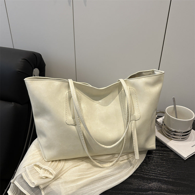 Retro fashion large capacity 2025 casual solid color new commuter retro soft surface tote underarm shoulder bag