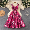 High-end floral print sleeveless dress for women, perfect for summer. elegant, high-waisted, and figure-flattering a-line silhouette, ideal for a sophisticated vacation look
