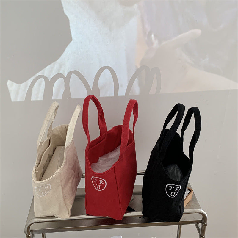 New bag female Korean generation with the same letter printed canvas handbag bento bag simple casual light tote bag