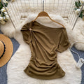 Korean style commute chic off-the-shoulder t-shirt: soft, breathable, relaxed fit with a cinched waist and asymmetrical design