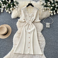 K-style pink buttoned knittingdress women's 2026 summer silmwork clothingelegant silmslimming look a-line skirt