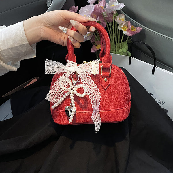 Versatile ins commuter portable small bag women's 2025 new fashion messenger bag summer simple casual shell bag