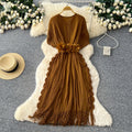 Fashion cross-border miyake pleated dress female v neck waist stereo flower decoration tassel long skirt elegantwork clothing