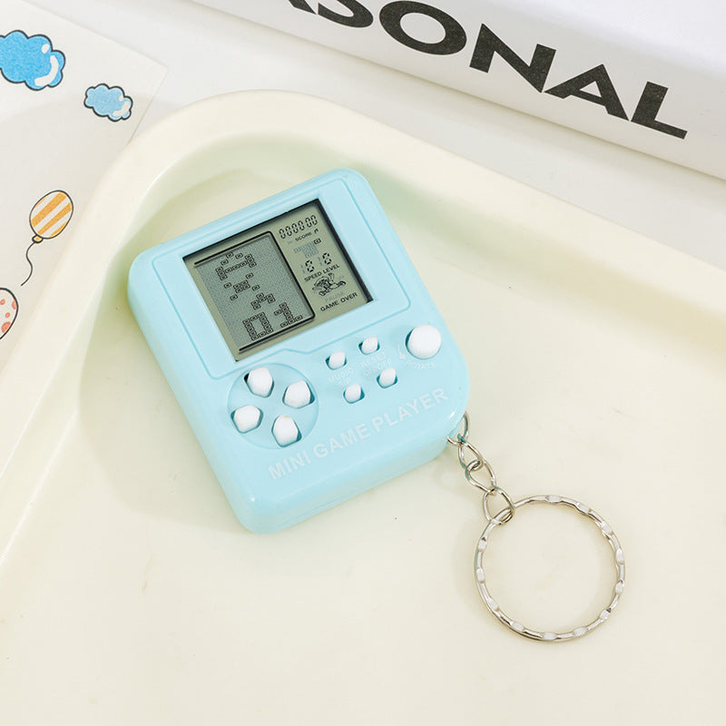 Pocket tetris game console - creative mini electronic game console keychain - nostalgic stress relief toy