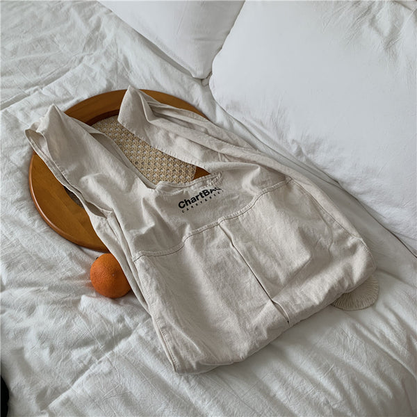 Women's bag new Korean version spring and summer canvas shoulder bag letter simple portable shopping bag Korean leisure art bag women