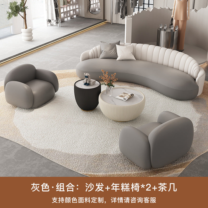 Luxury office reception area lounge hotel lobby front desk minimalist modern curved leather sofa