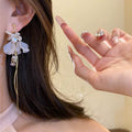 French romantic long floral tassel earrings - luxurious, elegant, and chic. a statement piece for the modern woman