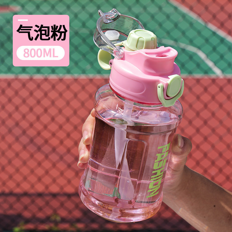 Summer large capacity outdoor sports water bottle for men and women, portable drop-proof plastic water bottle with bouncing straw space cup