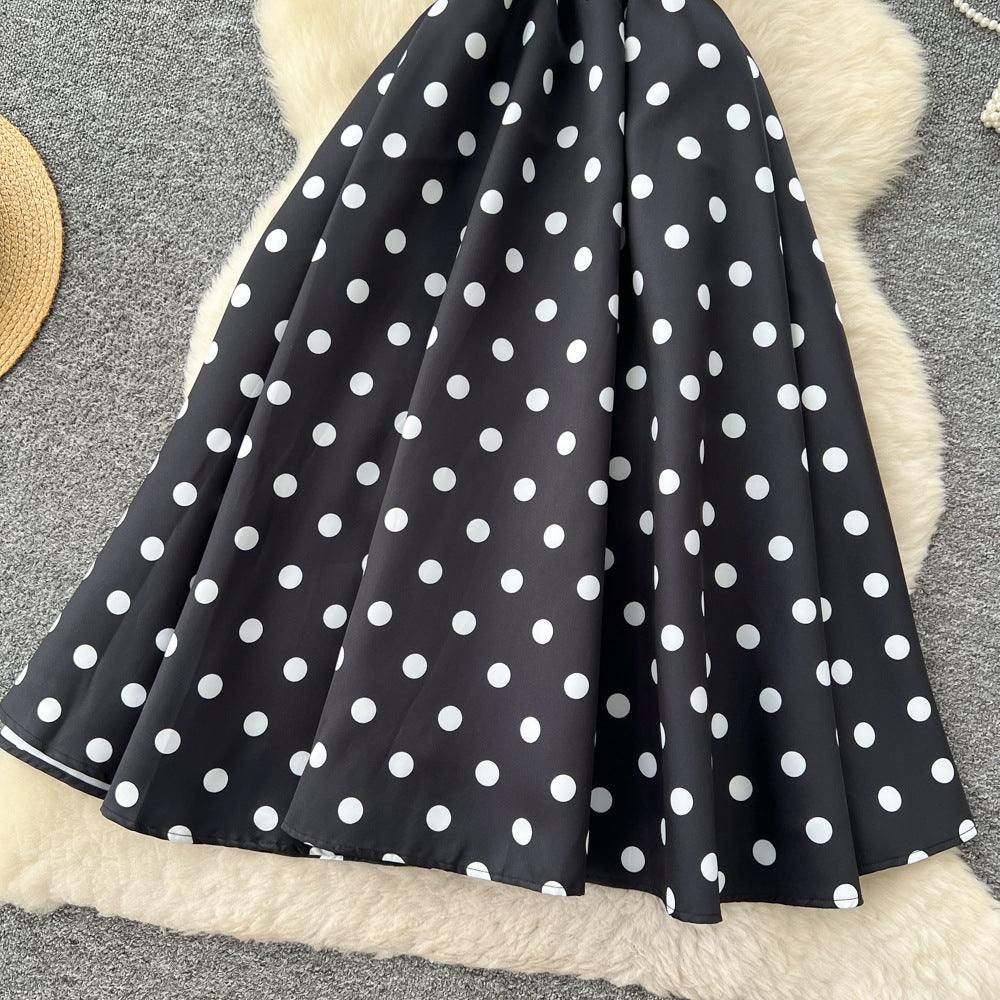 French high-end women's dress - autumn  collection: elegant bow-embellished camisole dress with cinched waist, flared hem, and polka dot detail - a flattering, flowy maxi dress
