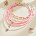 Wholesale pink shell necklace - european and american style, beach vacation vibe, fashionable beaded starfish pearl layered necklace for women
