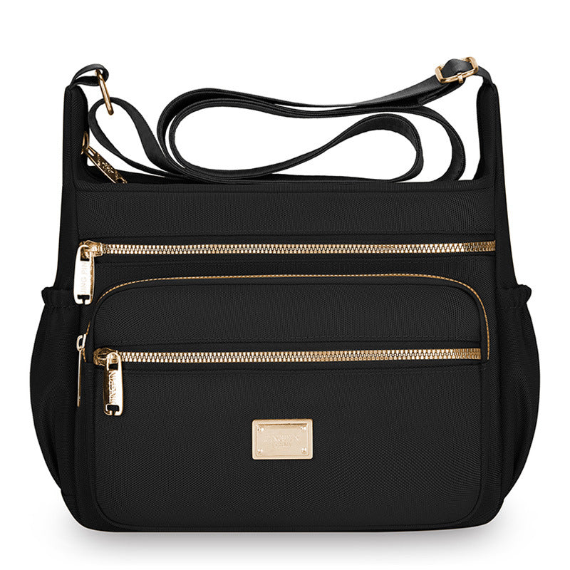 Women's bags are fashionable and simple, large-capacity messenger bags, multi-layer storage, travel shoulder bags, going out for commuting, middle-aged mother bags.