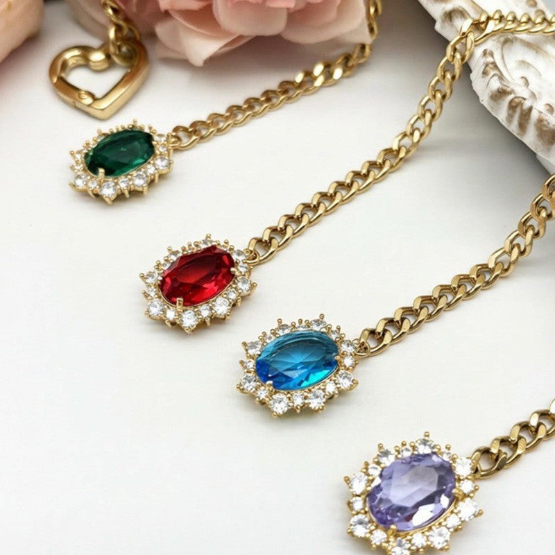 Women's heart-shaped slide chain necklace with detachable heart o-ring, gold cuban chain, and sparkling crystal pendant, adjustable