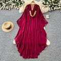 French-style, heavily embellished beaded v-neck hooded dress for women, perfect for spring. features a wine-red, asymmetrical hemline, exuding a sophisticated and elegant vibe