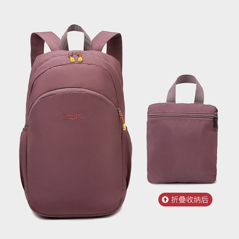 New foldable storage backpack women's travel bag simple casual nylon lightweight outdoor backpack schoolbag