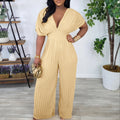 C8592  foreign trade  new european and american cross-border fashion v-neck high-waisted solid color sexy pleated jumpsuit