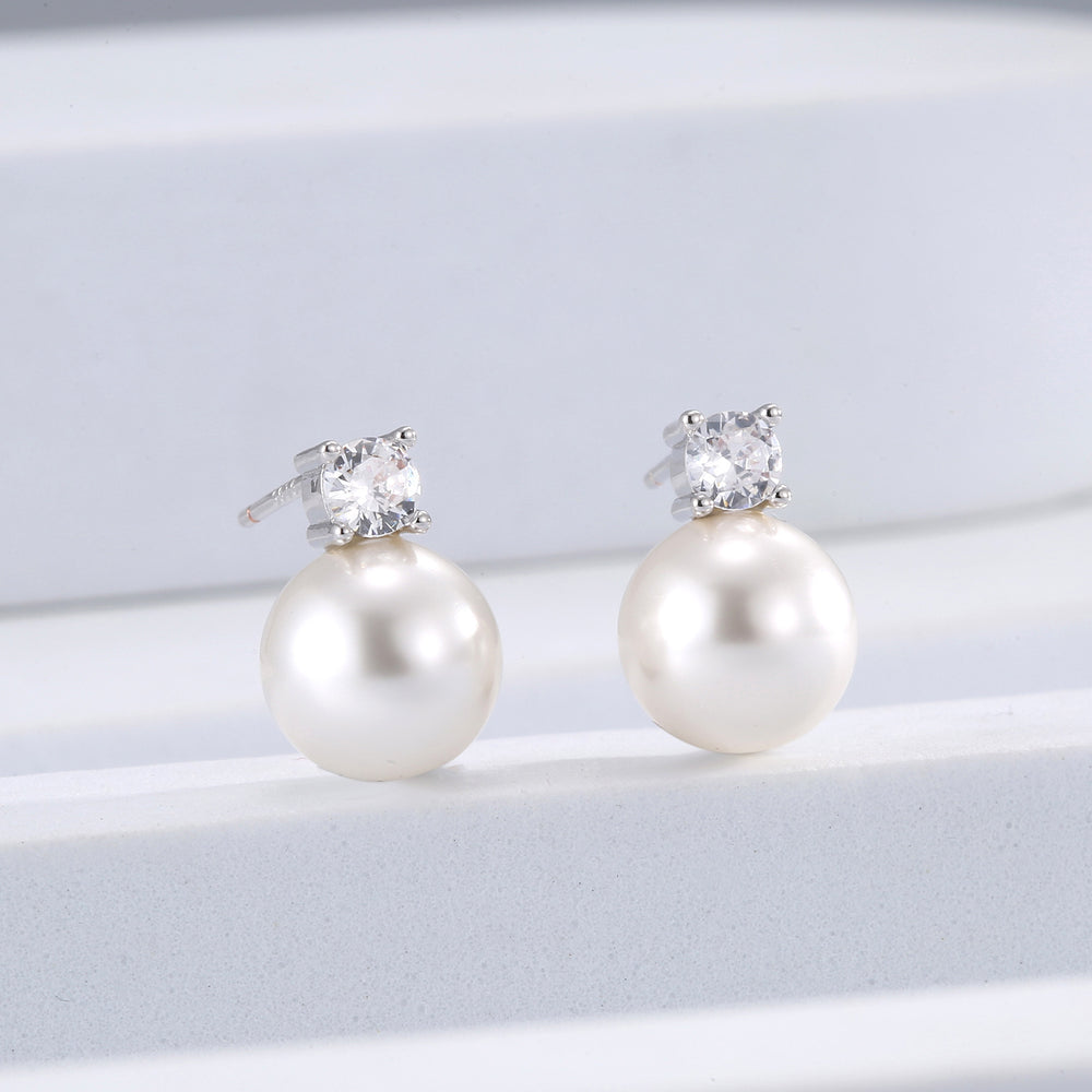 Copper plated real gold earrings for women four prongs single diamond sweet pearl hong kong style small elegant earrings accessible luxuryniche style earrings