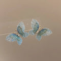 High-end, ethereal gradient 3d butterfly stud earrings for women. unique, niche design, fashionable, elegant, and versatile
