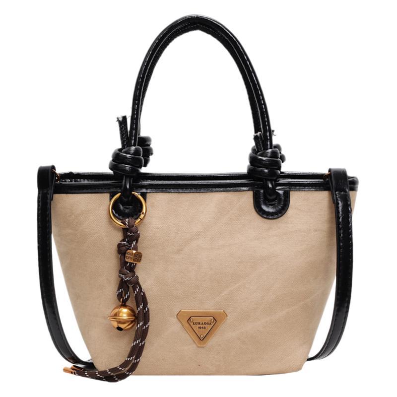 Retro new design Korean light luxury foreign fashion portable bucket bag versatile high sense women commuter messenger bag