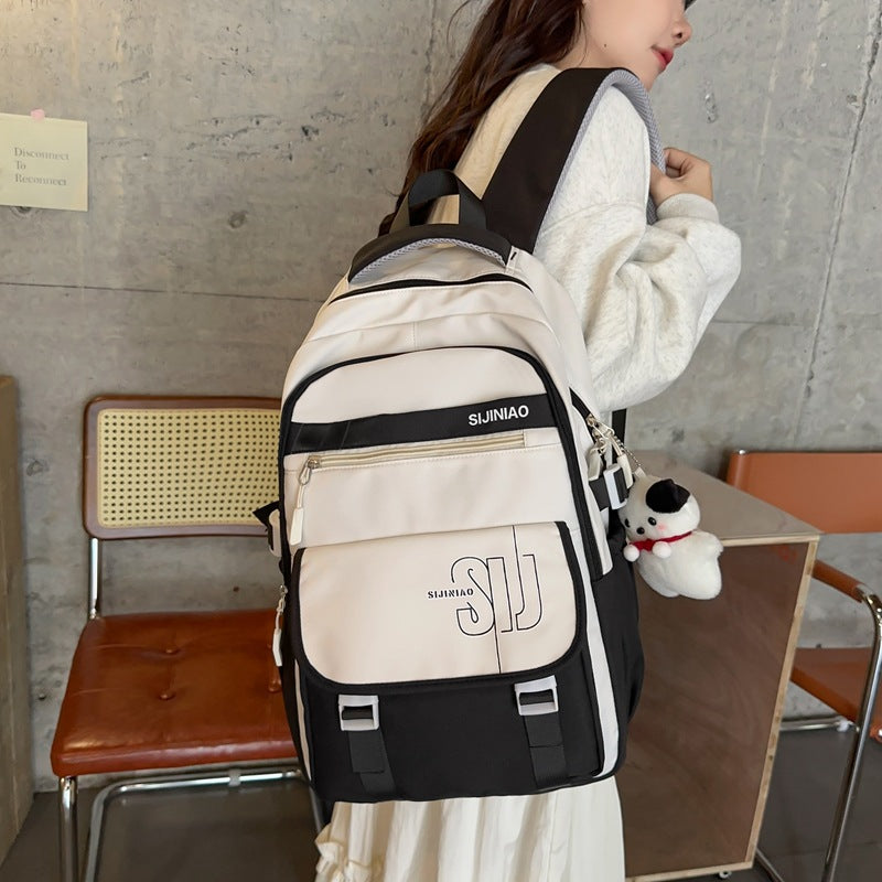 Large-capacity load reduction spine bag for female primary school students, junior high school students, high school students, college students, backpack for women 2023 new models