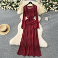 Gentle wind niche styleclassy round neck long sleevescut outknittingdress women's inner suspender skirt layered two-piece set