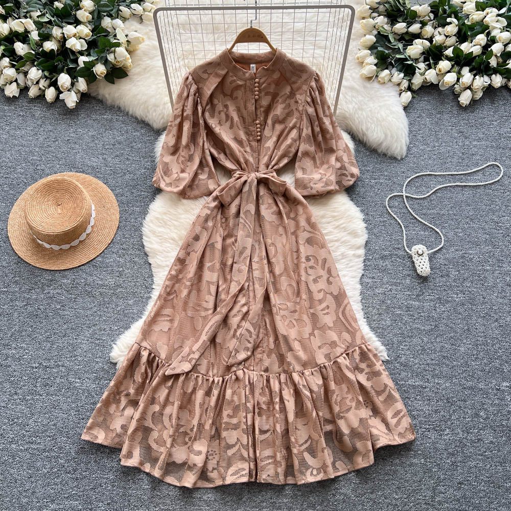 French-inspired v-neck floral chiffon dress with flared sleeves, tie waist, and a figure-flattering, vintage-inspired silhouette