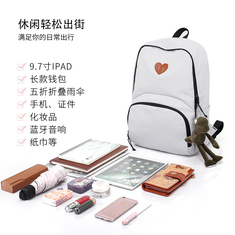 New simple and versatile schoolbag, high-value dirt-resistant belt, doll large-capacity backpack, male and female middle school student backpack.