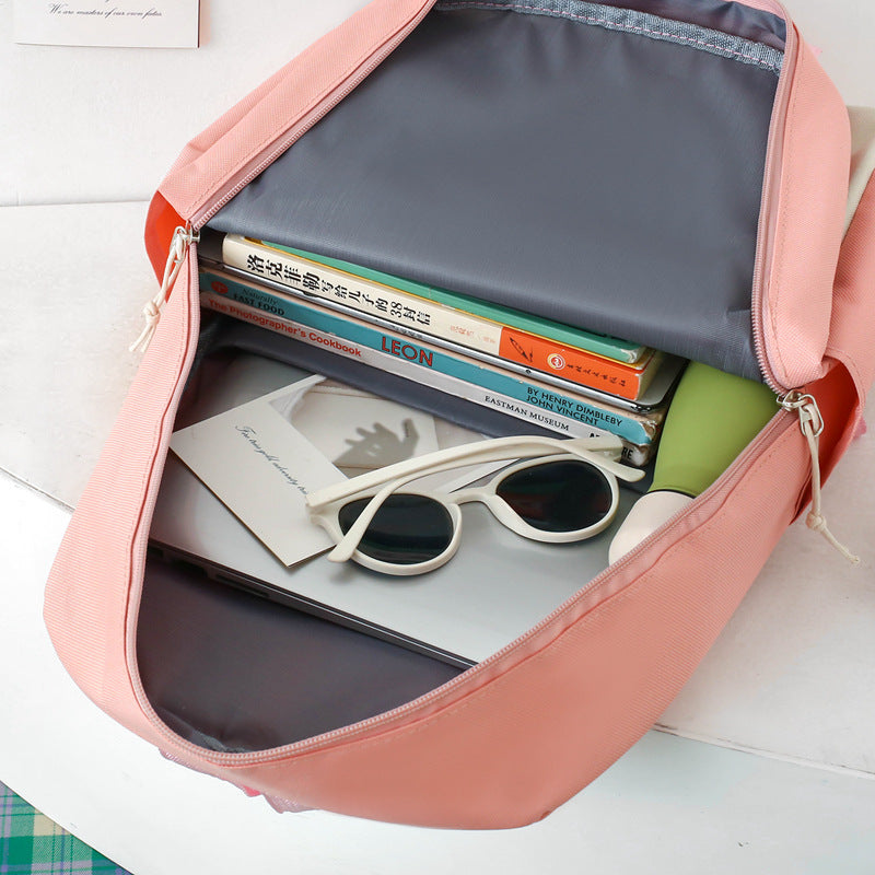 New primary school schoolbag women's lightweight large-capacity junior high school student campus backpack four-piece casual backpack bags