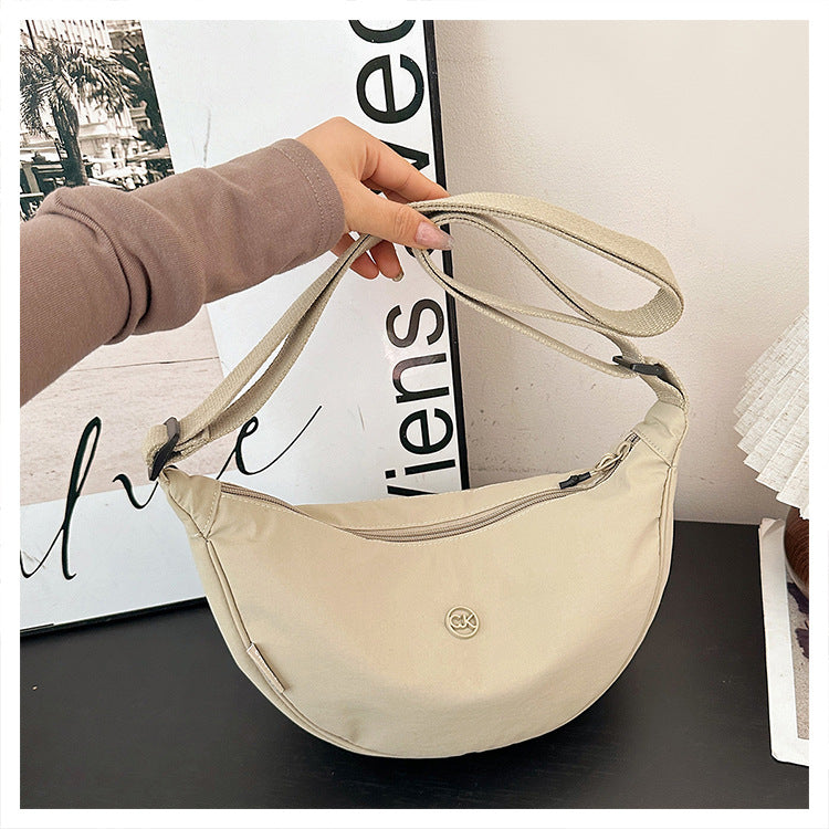 Spring casual macaron color dumpling bag 2026 new versatile crossbody bag women's korean style commuter shoulder bag