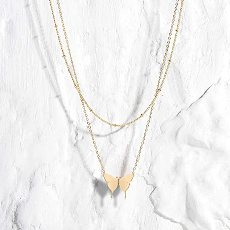 Amazon new jewelry butterfly pendant double layer rice beads butterfly necklace casual daily butterfly necklace