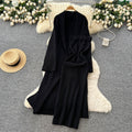 Minimalist solid color knitted mature woman's winter set: slim-fit bandeau dress with long cardigan coat