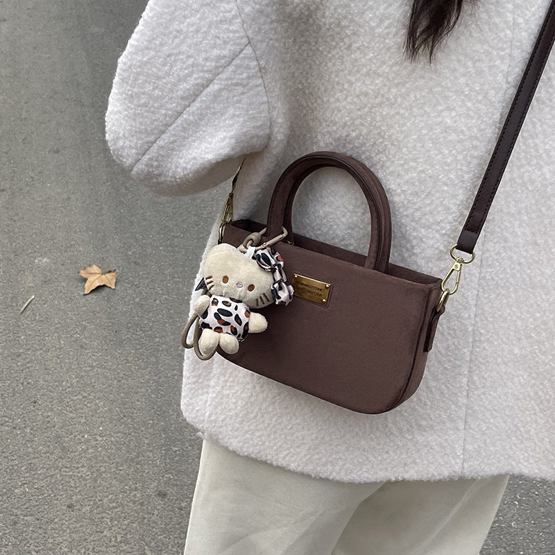 Frosted box bag, hand carry small bag, women's 2025 new autumn and winter retro suede messenger bag, mobile phone bag.