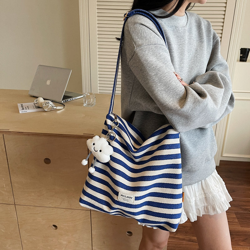 Cross-border striped bag women's large capacity 2025 new summer versatile casual messenger bag college student class tote bag
