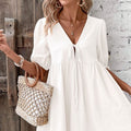 Amazon  european and american cross-border elegance loose woven deep v neck sense of design chest tie a swing dress