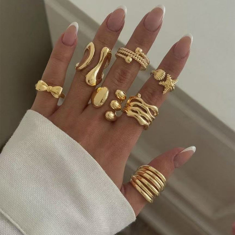 Wholesale fashion jewelry rings: european & american geometric, high-end bow, starfish, unique lava rock knuckle ring set for women