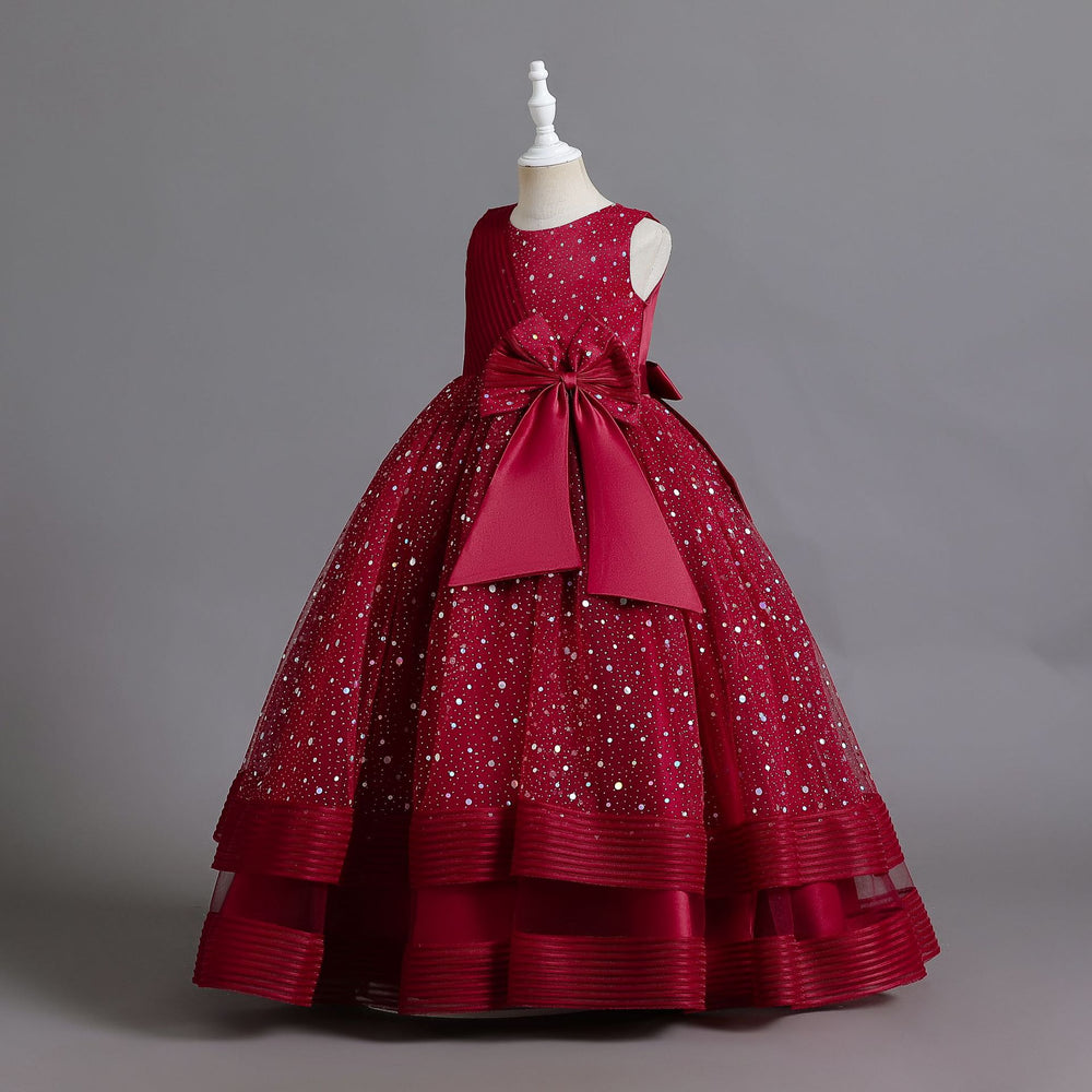 Ready-to-ship wholesale children's polka dot formal dresses, featuring large bow princess skirts for girls, high-end flower girl dresses, and kids' dresses
