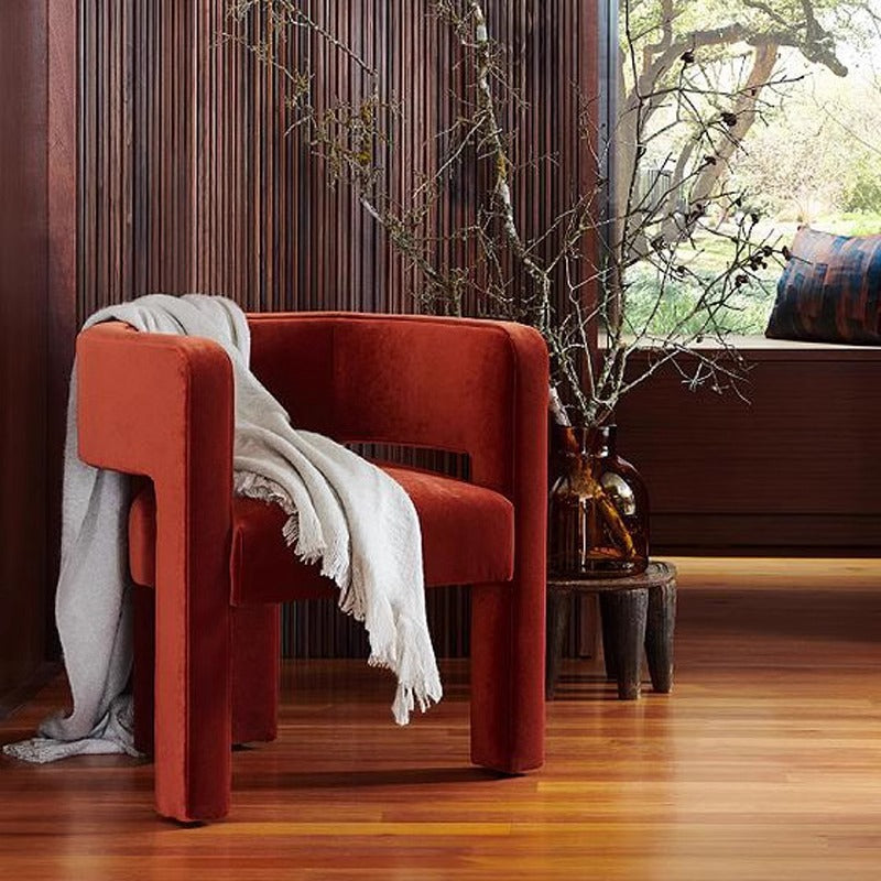 Creative single sofa light luxury minimalist modern ins living room leisure chair orange fabric reception armchair