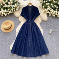 High-end women's dress:  summer collection - sophisticated deep v-neck, cinched waist, button-down, slim-fit, pleated casual denim dress
