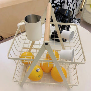 Here are a few options, depending on the specific nuance you want to convey:  **option 1 (most common & versatile):**  double-layer desktop organizer basket - home storage for snacks, fruits, and vegetables  **option 2 (more descriptive):**  two-tier desk
