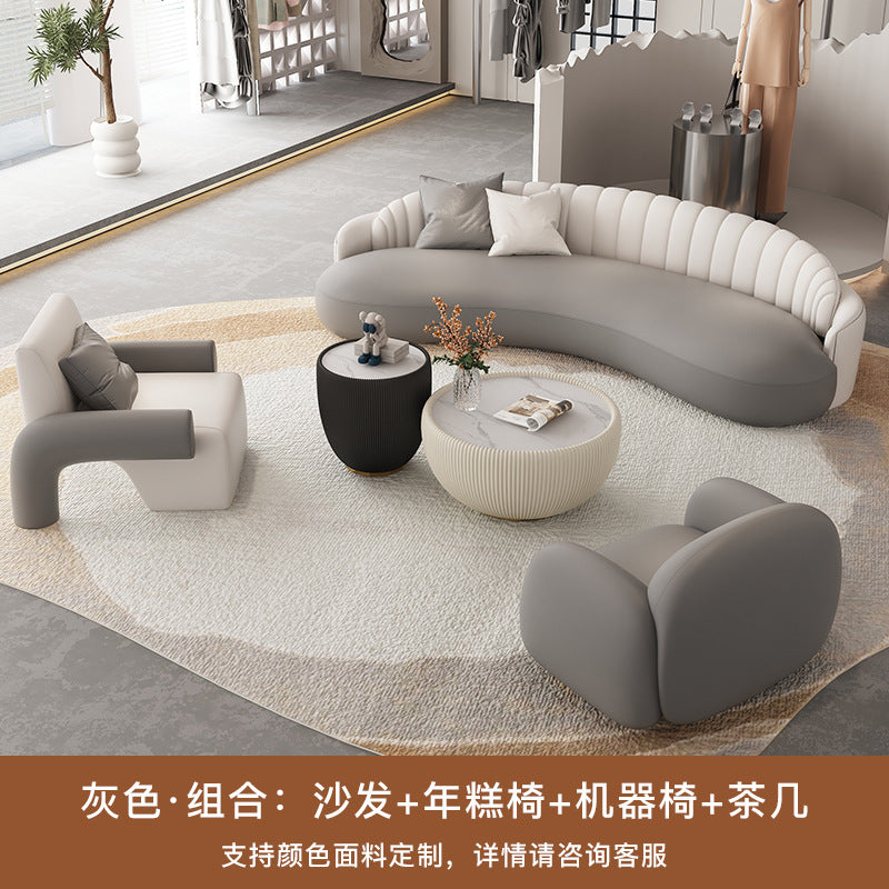 Luxury office reception area lounge hotel lobby front desk minimalist modern curved leather sofa