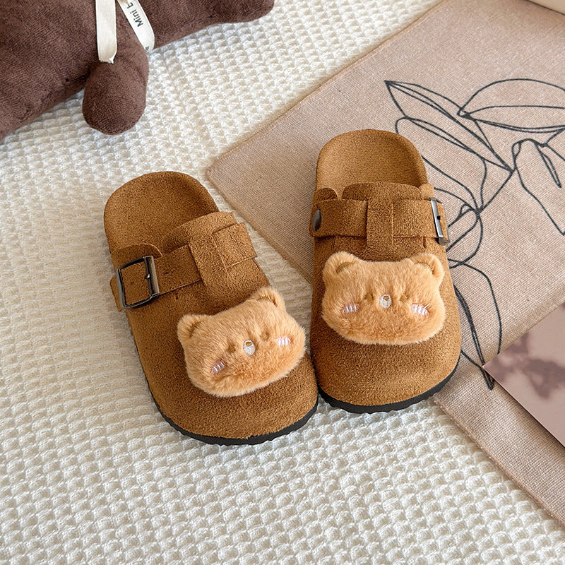 Cute and cuddly birkenstock-inspired slippers for kids, perfect for spring and autumn wear. these closed-toe, half-slippers feature a soft, comfortable sole and a slip-on design, making them ideal for lazy days