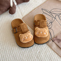 Cute and cuddly birkenstock-inspired slippers for kids, perfect for spring and autumn wear. these closed-toe, half-slippers feature a soft, comfortable sole and a slip-on design, making them ideal for lazy days