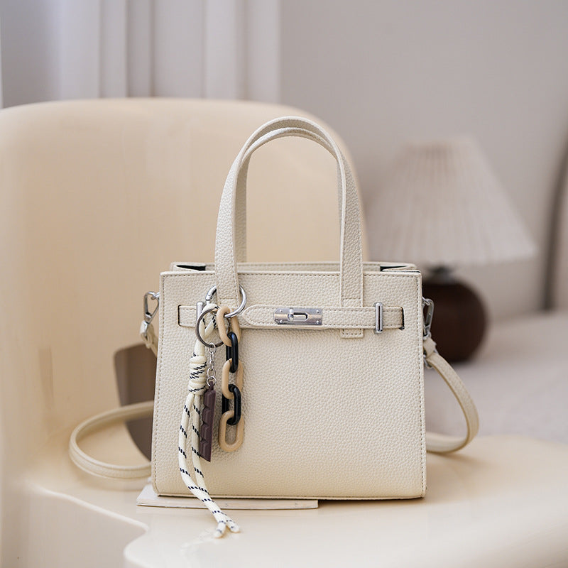 Cross-border niche soft leather portable Kelly bag women's bag 2025 new simple shoulder bag lychee pattern commuter messenger bag