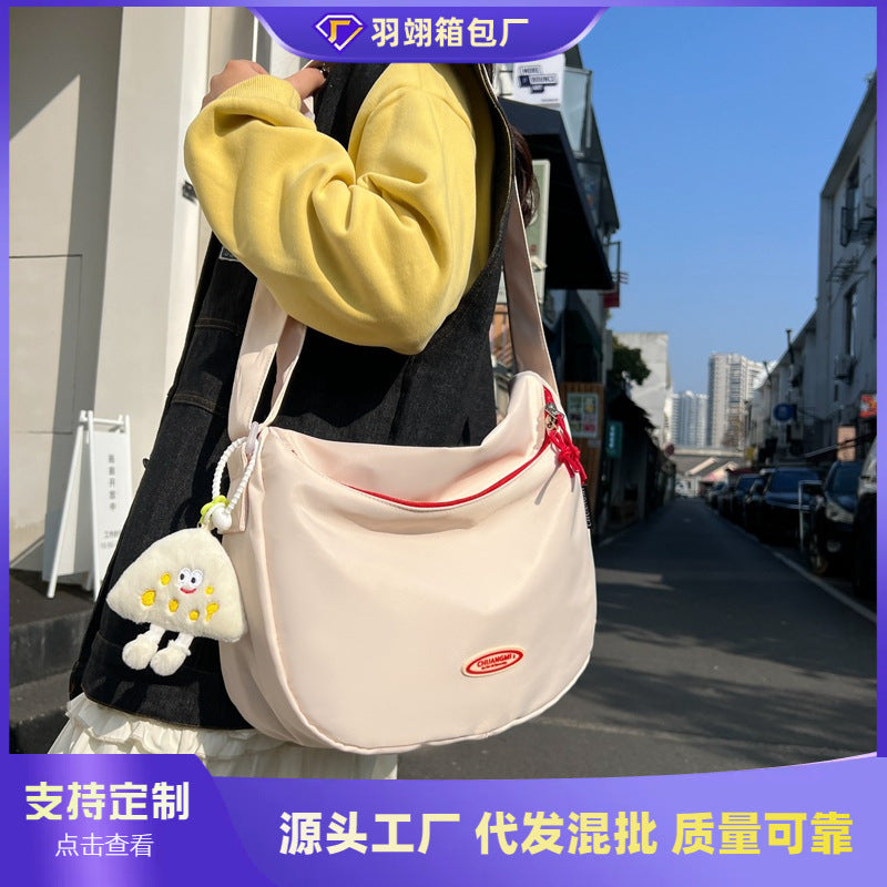 Foreign single nylon cloth bag women's large capacity 2025 new summer versatile shoulder messenger bag casual commuter dumpling bag