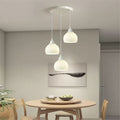 Modern minimalist dining room pendant light - creamy new style  - trending online - perfect for dining tables, bedrooms, studies, and bar counters - glass pendant lamp