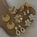 European and american cross-border sweet alloy enamel flower earrings - women's stylish, versatile, vacation-inspired leaf stud earrings wholesale